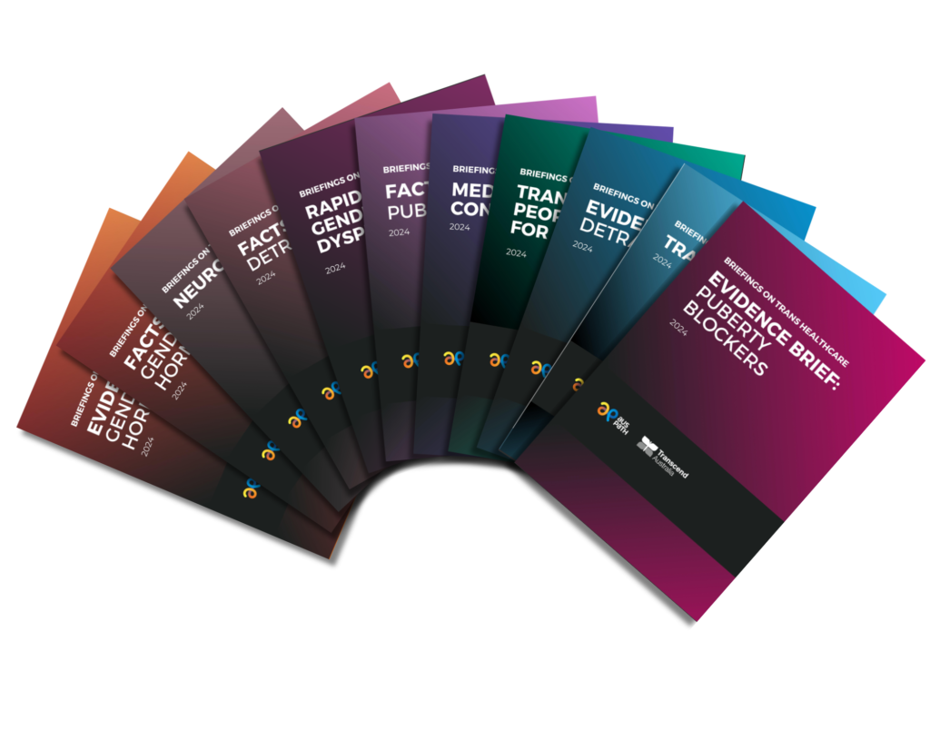 An array of colorful brochures titled "Briefings on Trans Healthcare" is displayed. Each booklet is styled with a gradient color theme, ranging from warm tones (orange and red) to cool tones (blue and green). The covers prominently feature the year 2024 and logos from associated organizations